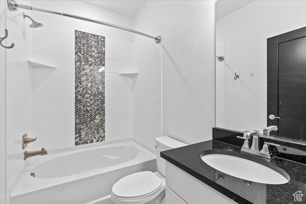 Full bathroom with vanity and shower / tub combination