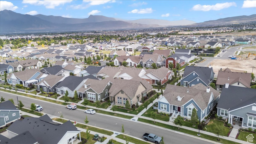 Aerial view of residential area featuring mountains