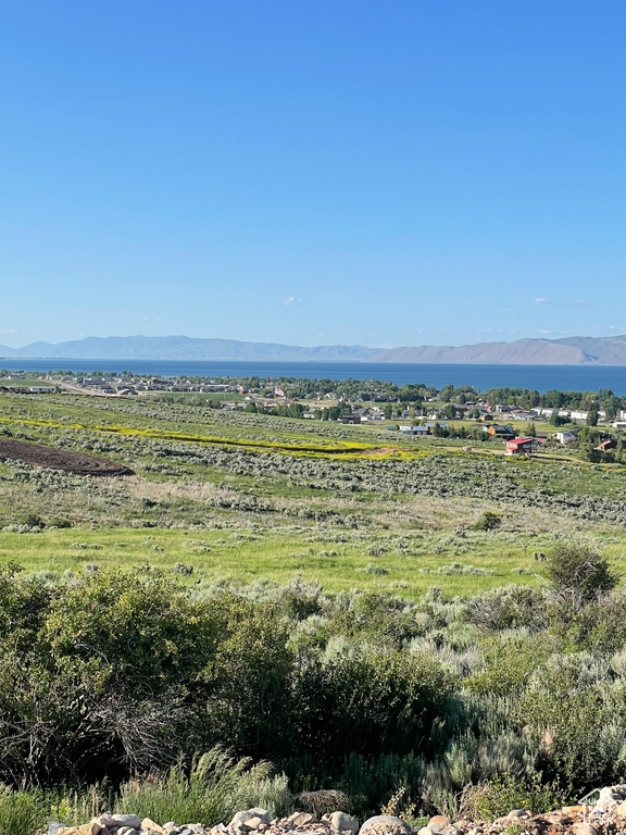 View of mountain background featuring rural landscape