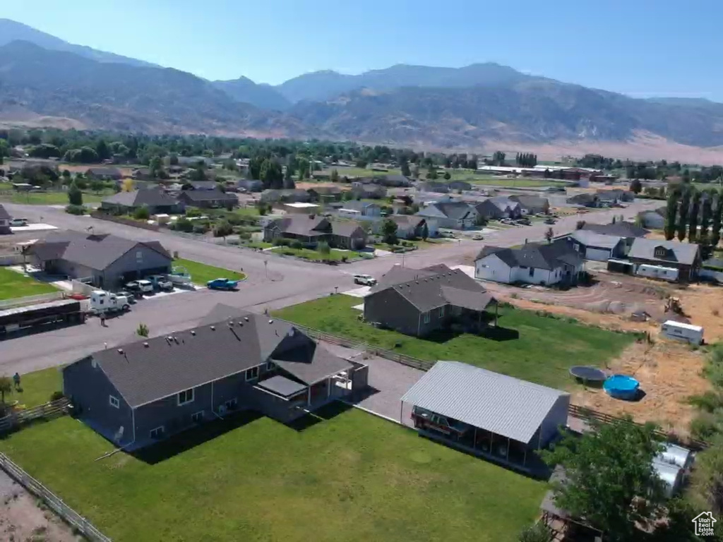 Aerial view of residential area featuring mountains