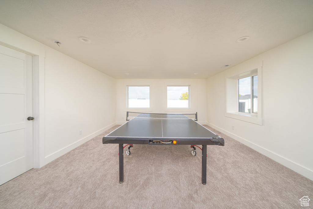 Playroom with carpet and baseboards