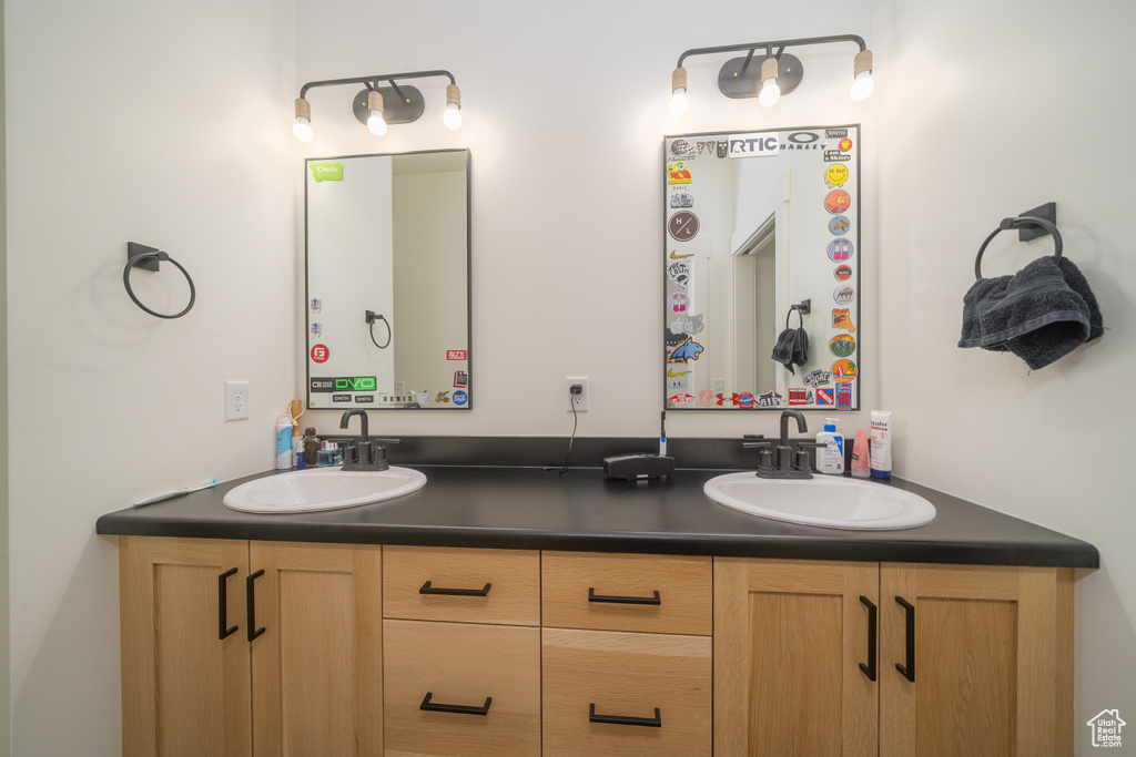 Bathroom featuring double vanity