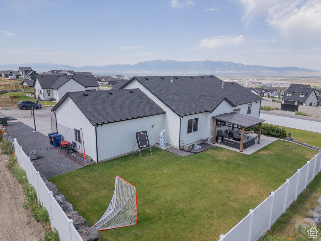 Aerial view of residential area with mountains