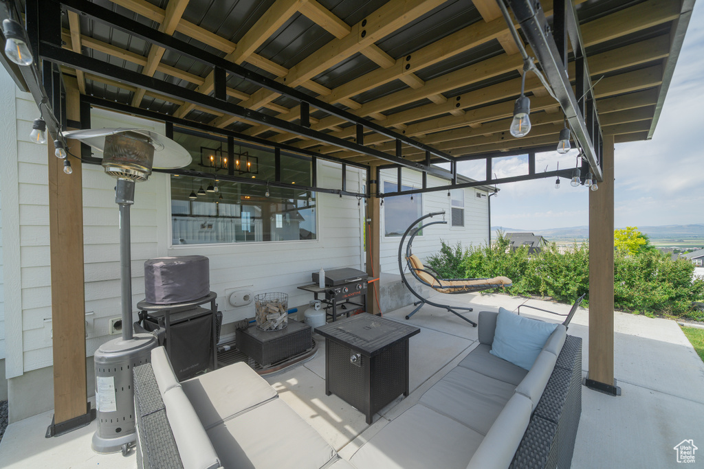 View of patio / terrace with an outdoor living space and grilling area