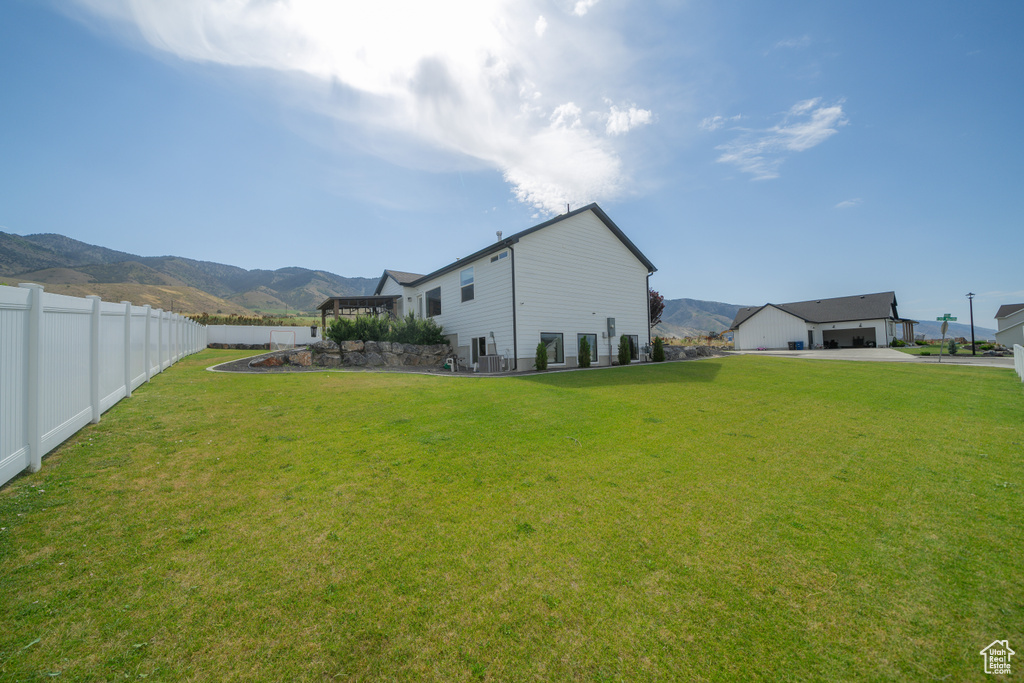 View of yard with a mountain view