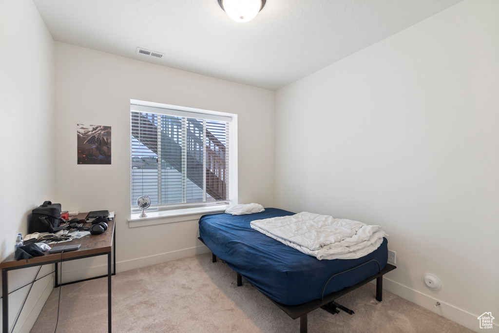 Bedroom featuring carpet