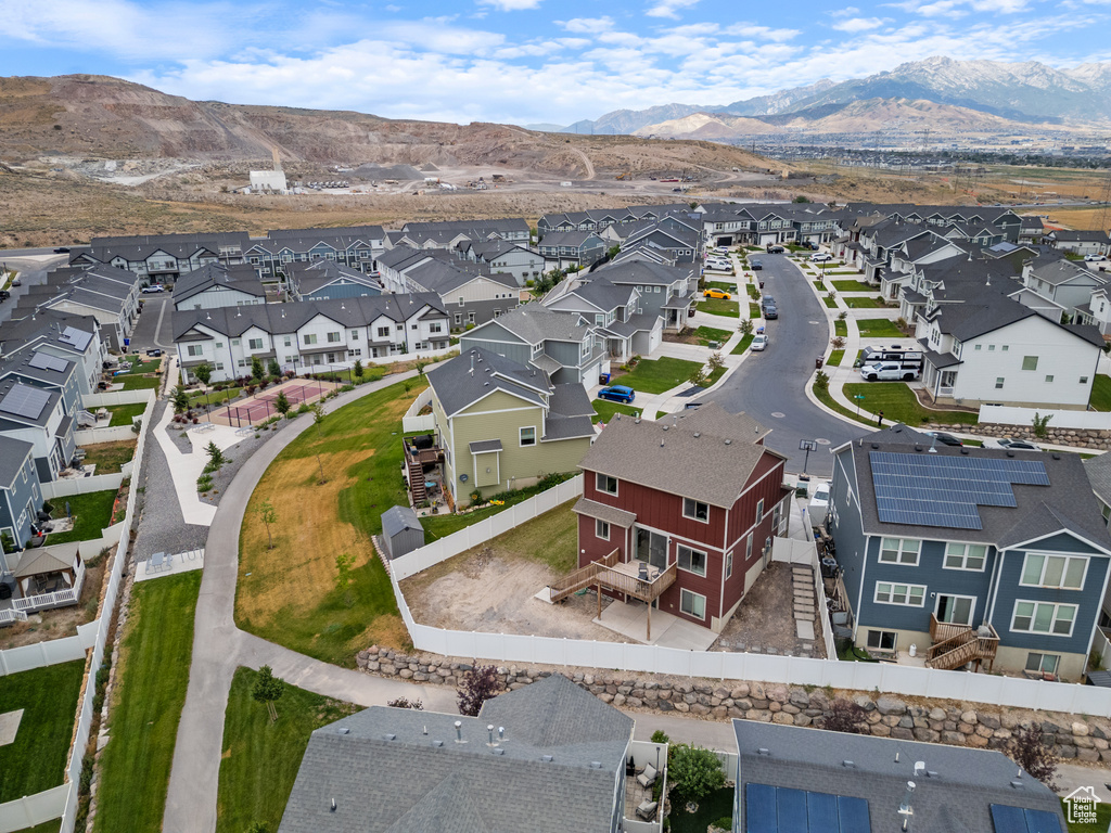Aerial view of residential area with a mountainous background