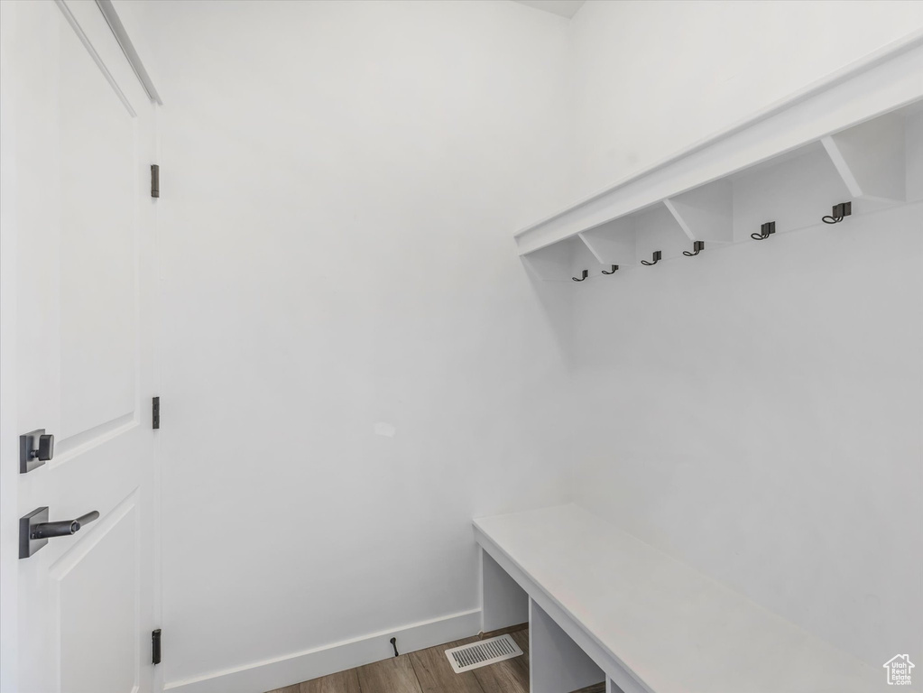 Mudroom featuring wood finished floors