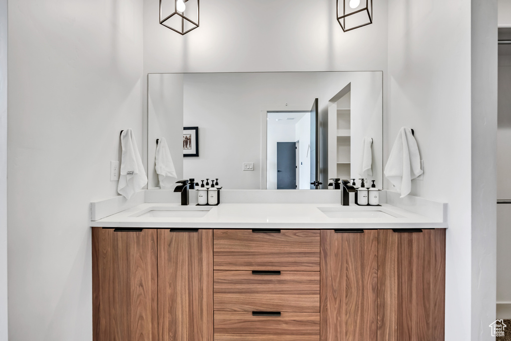 Bathroom featuring double vanity