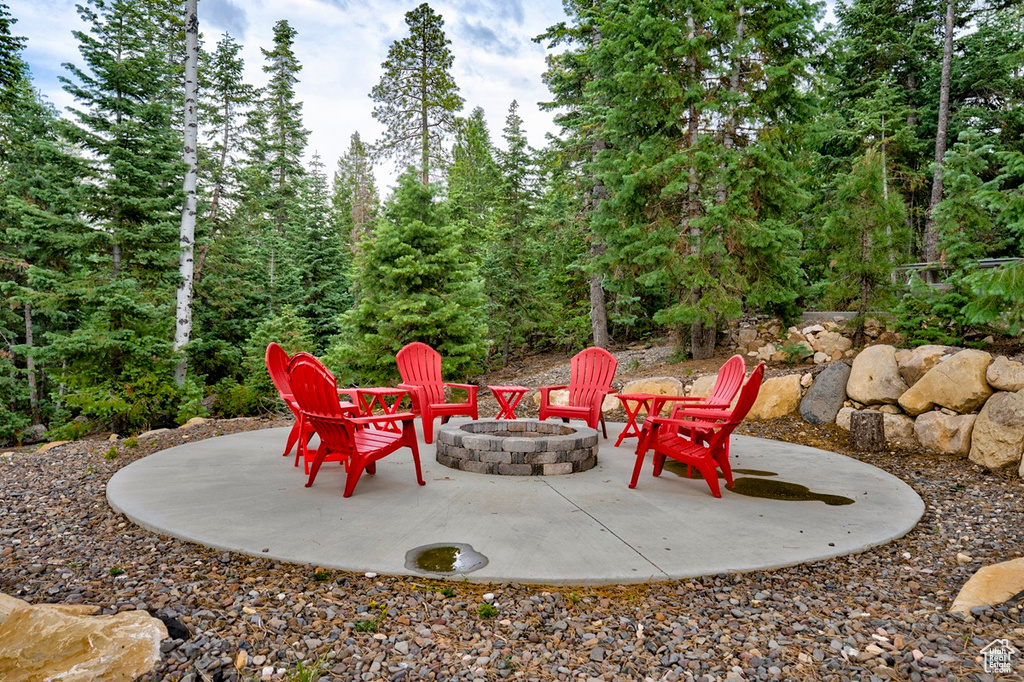 View of patio / terrace with a fire pit