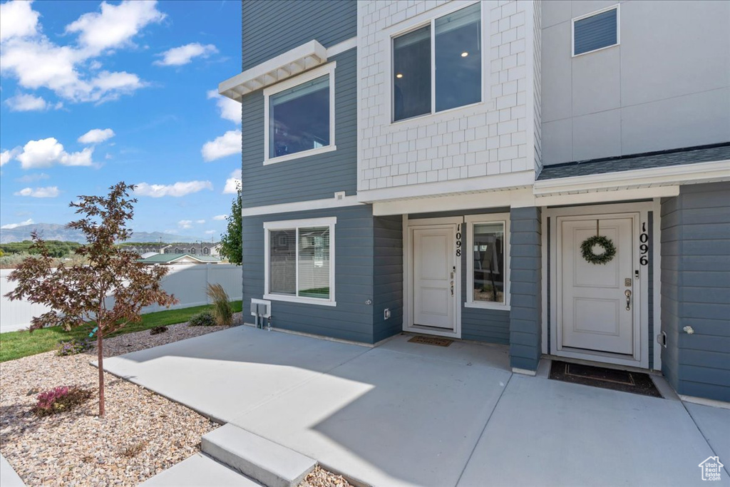 View of front of property with a patio