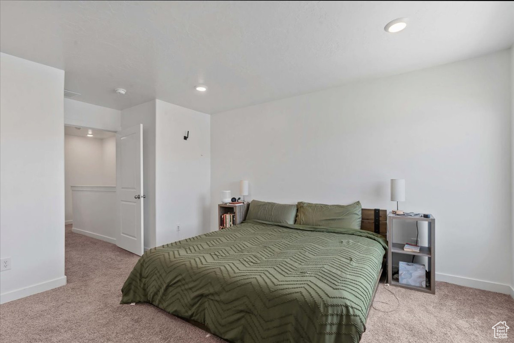 Bedroom with carpet and recessed lighting
