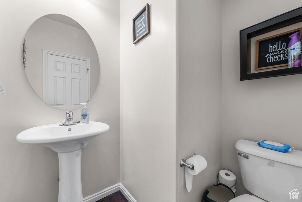 Half bathroom featuring toilet