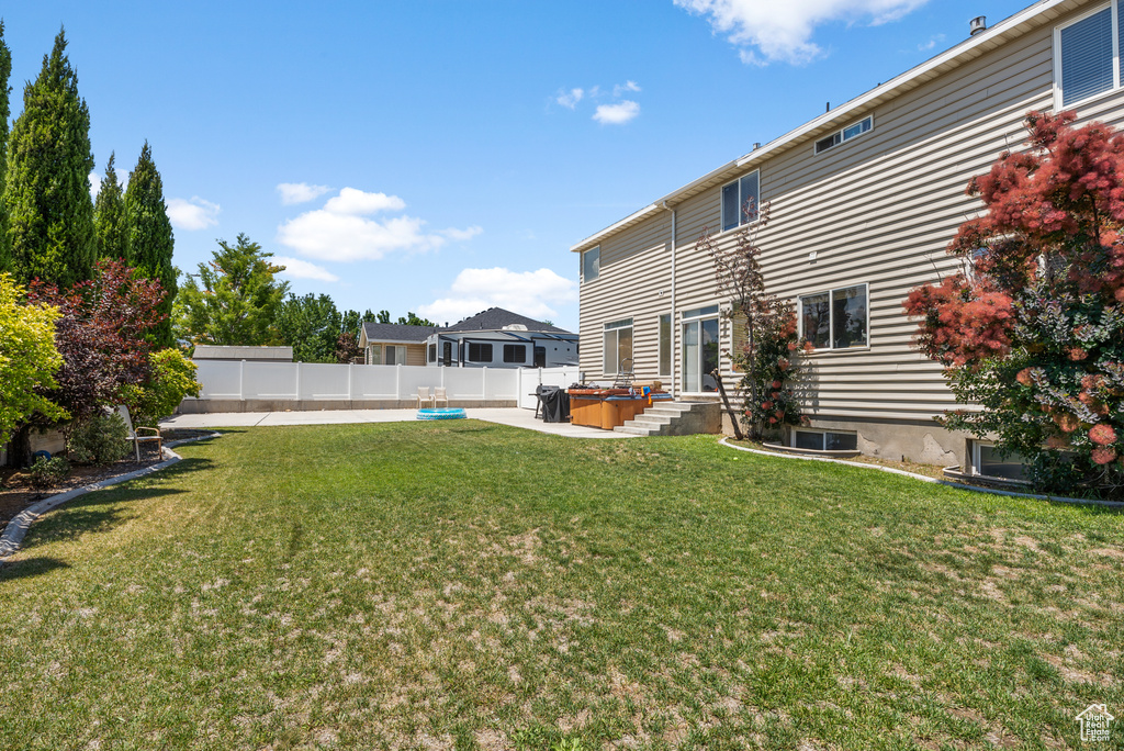 View of yard featuring a patio