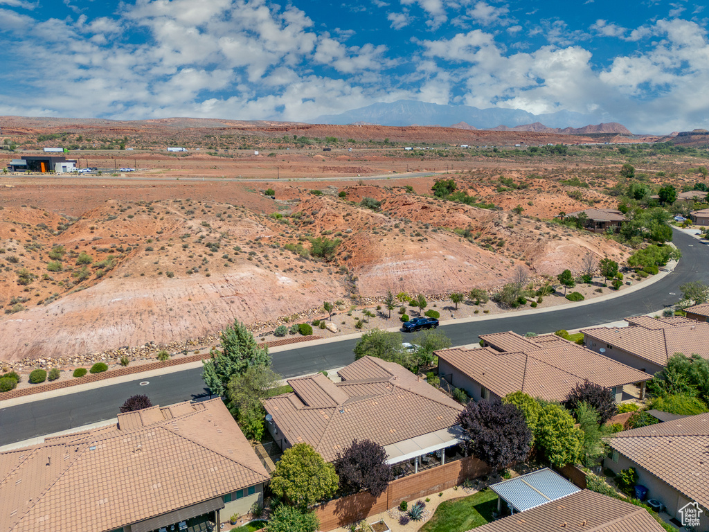 Aerial perspective of suburban area with a mountain backdrop