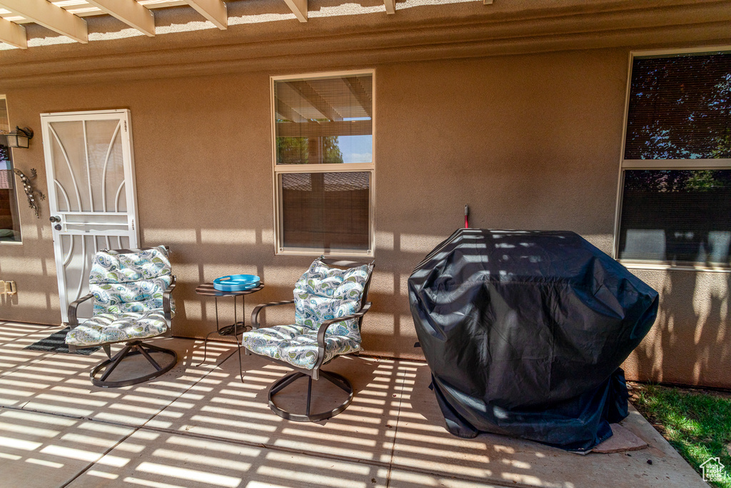 View of patio featuring area for grilling