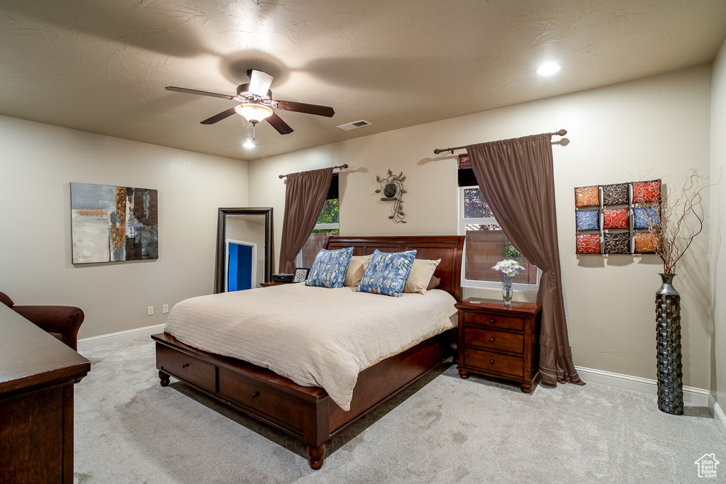 Bedroom with carpet flooring and ceiling fan