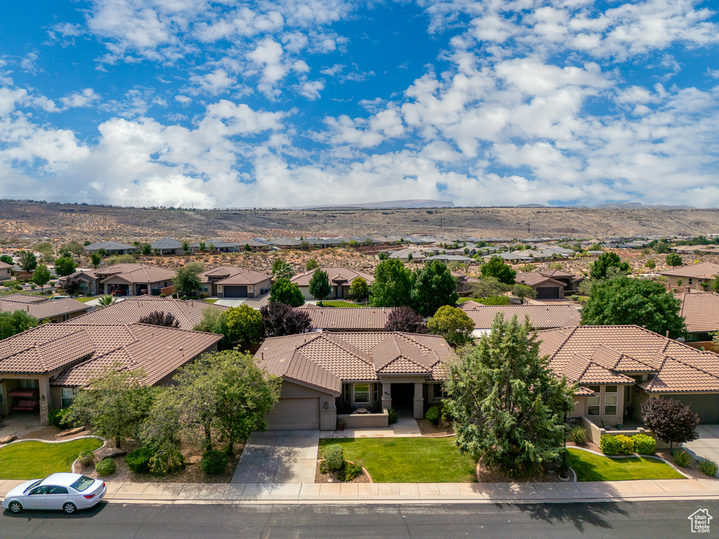 Aerial perspective of suburban area featuring mountains