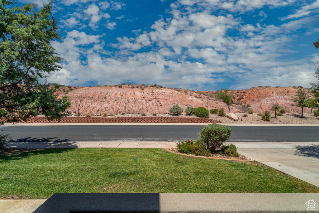 View of concrete road with a mountain view