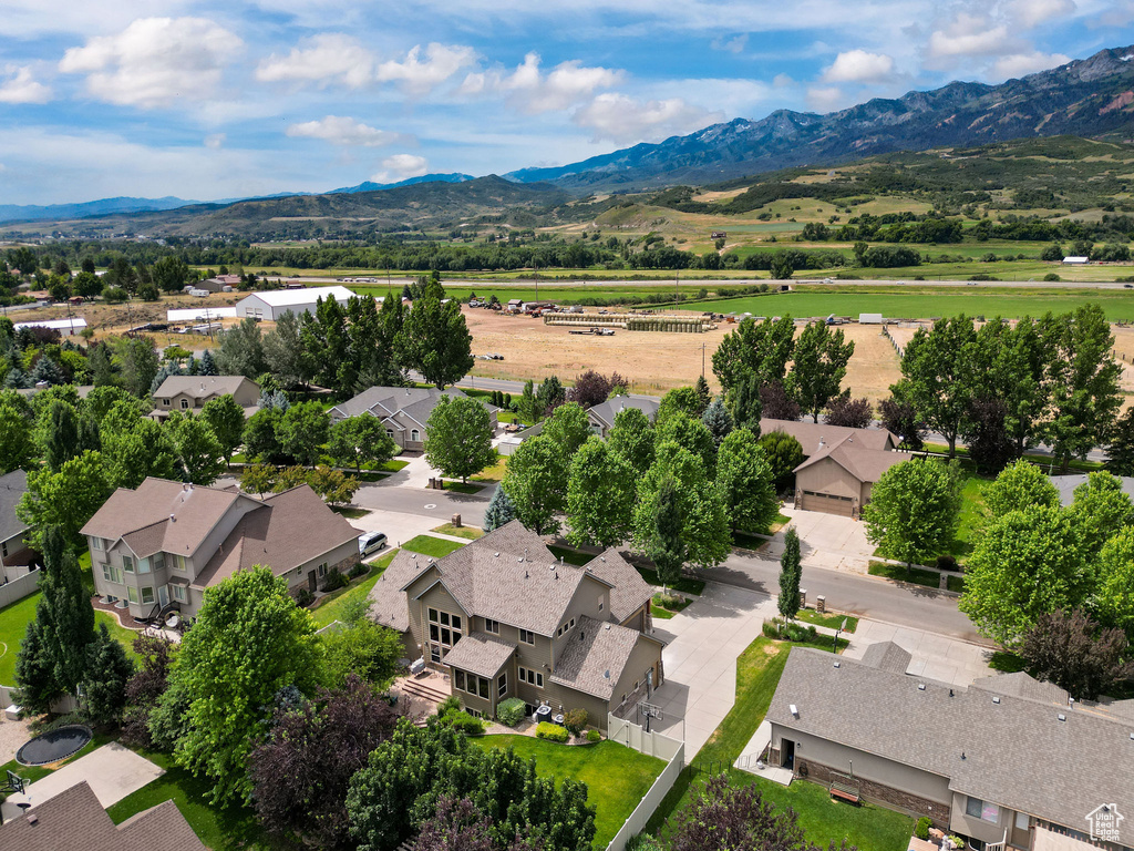 Aerial perspective of suburban area featuring mountains