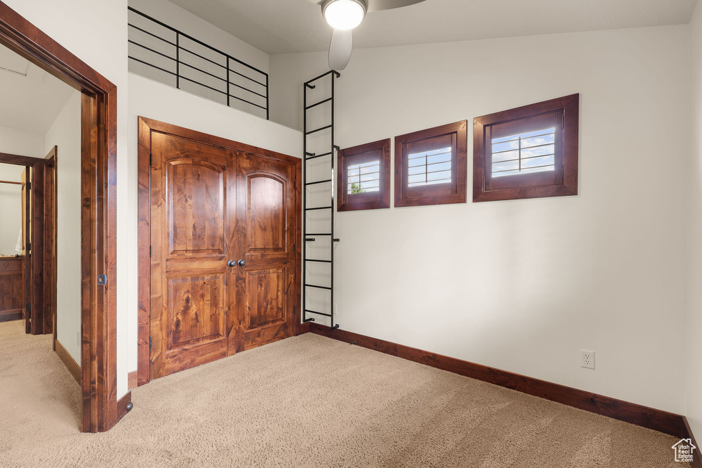 Unfurnished bedroom featuring carpet flooring