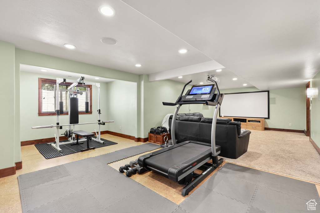 Exercise room featuring recessed lighting