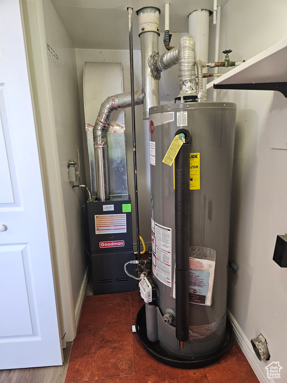 Utility room with gas water heater