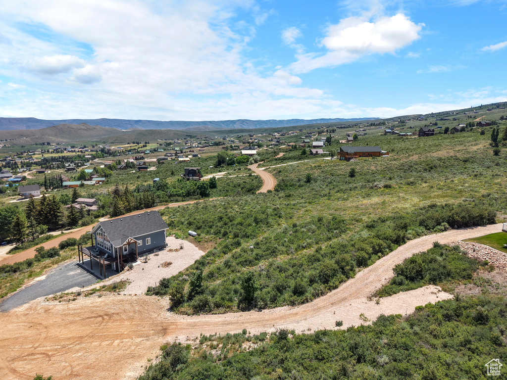View from above of property featuring a mountain backdrop