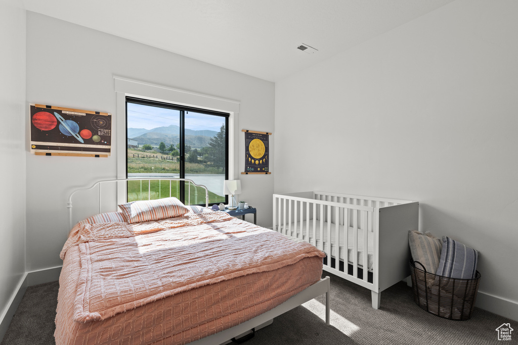 Bedroom with carpet flooring