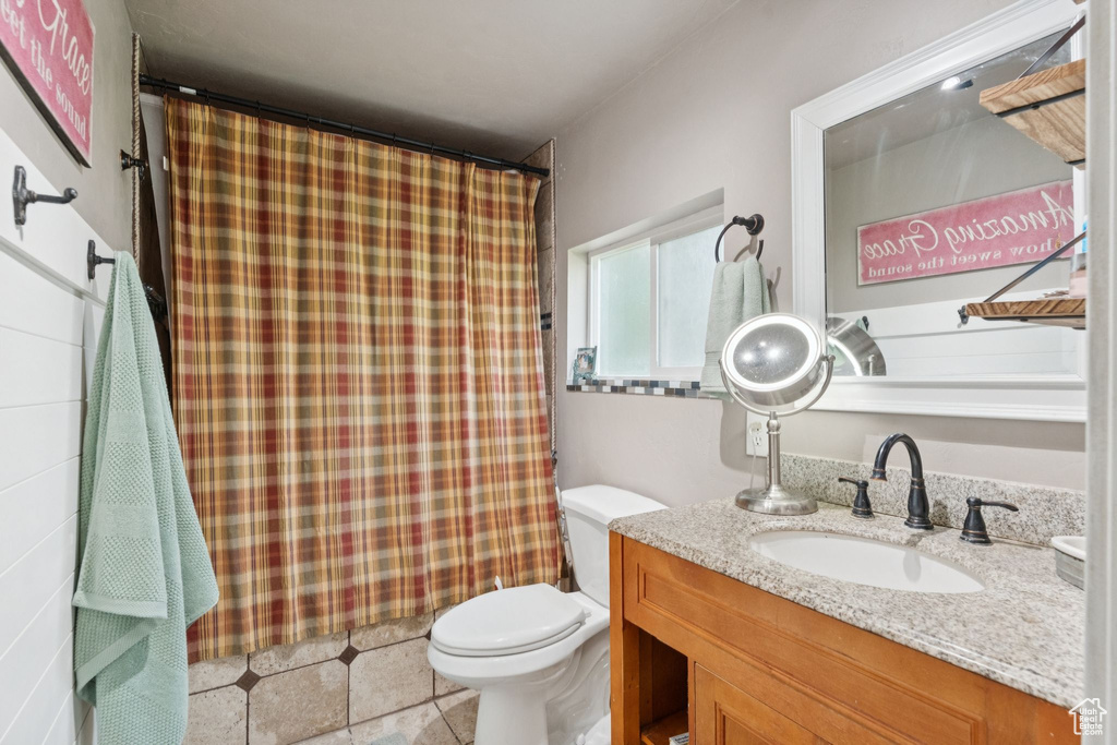 Bathroom with vanity and a shower with curtain