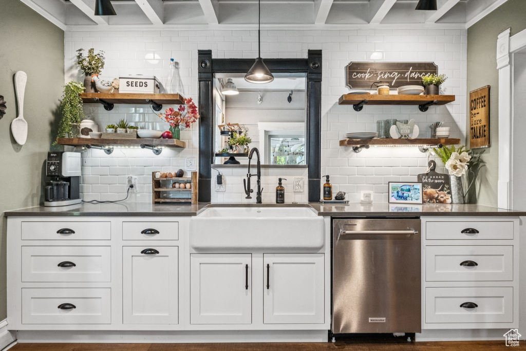 Bar with stainless steel dishwasher, tasteful backsplash, and hanging light fixtures