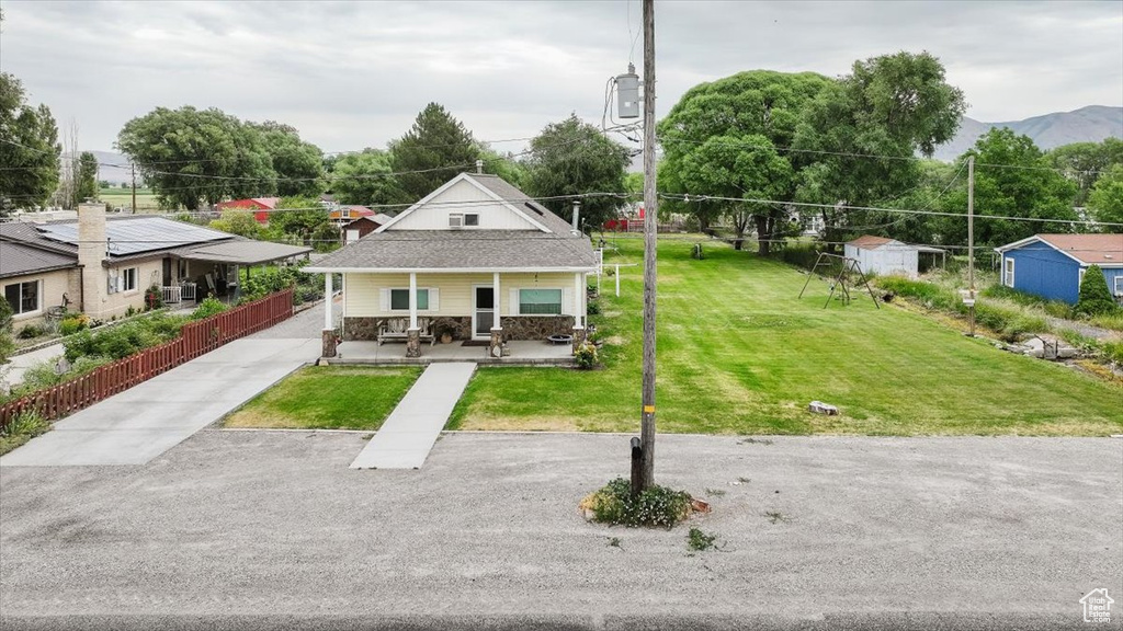 View of front of home with covered porch