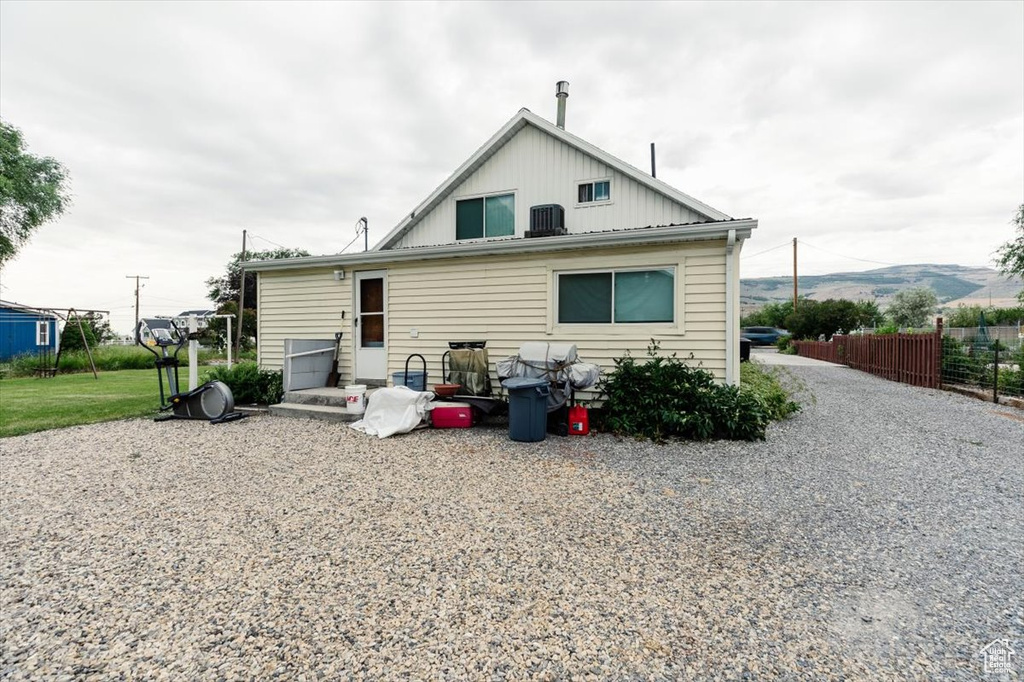 Back of house featuring board and batten siding