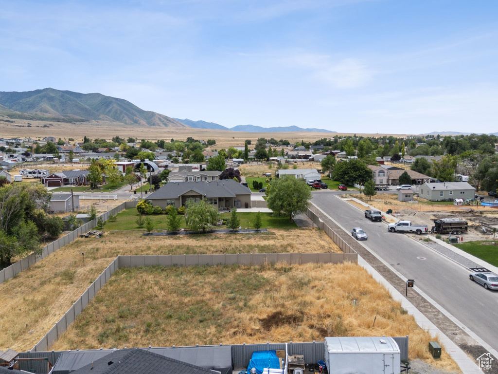 Aerial view of residential area featuring mountains