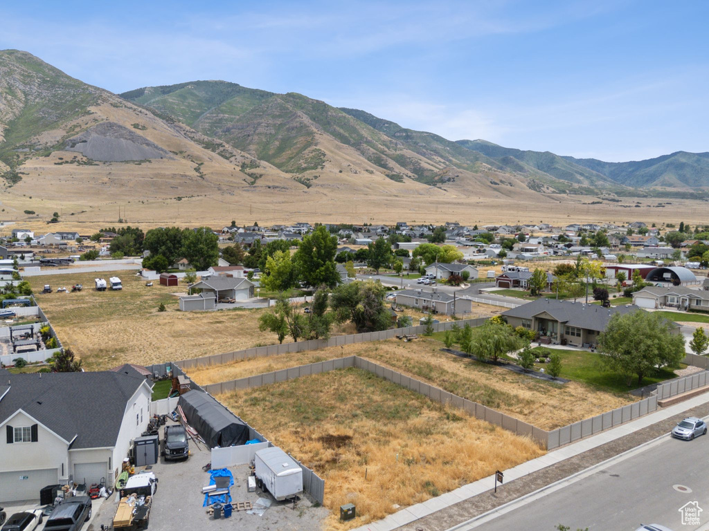 View of mountain background featuring nearby suburban area