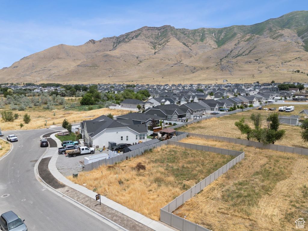 View of mountain background featuring nearby suburban area