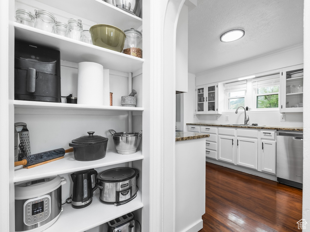 Pantry featuring a sink