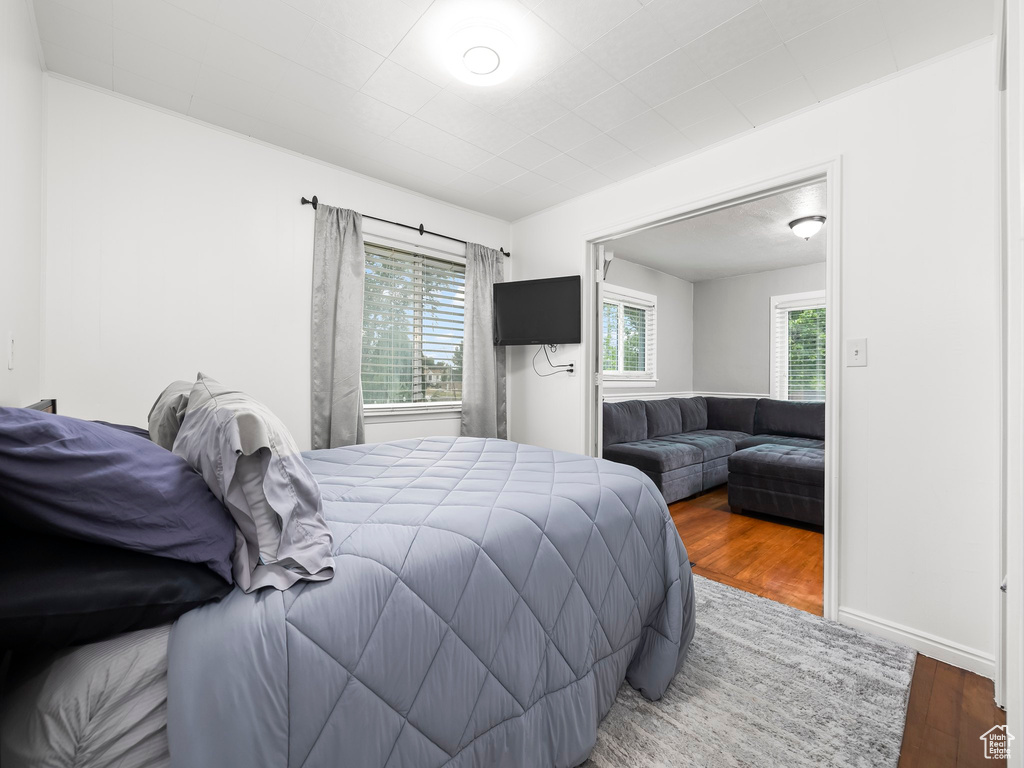 Bedroom with wood finished floors