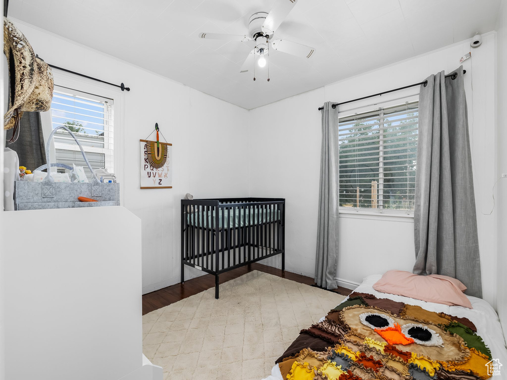 Bedroom featuring multiple windows