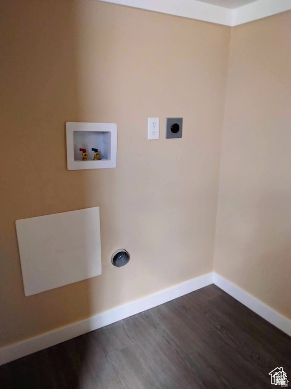 Washroom featuring hookup for an electric dryer, washer hookup, and dark wood-style flooring