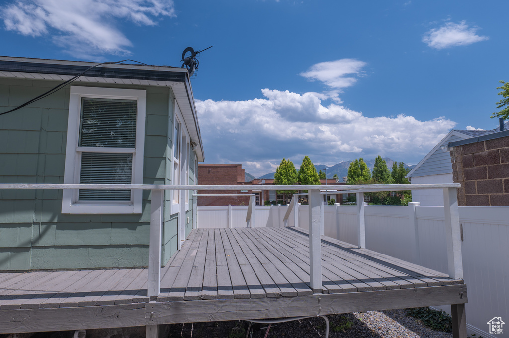 Wooden deck featuring a mountain view