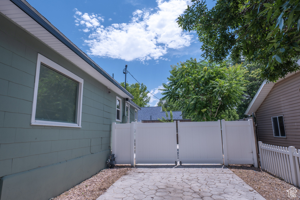 Gate featuring a patio area