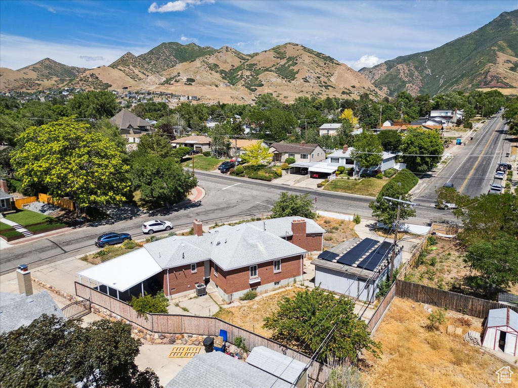 Aerial view of residential area with mountains
