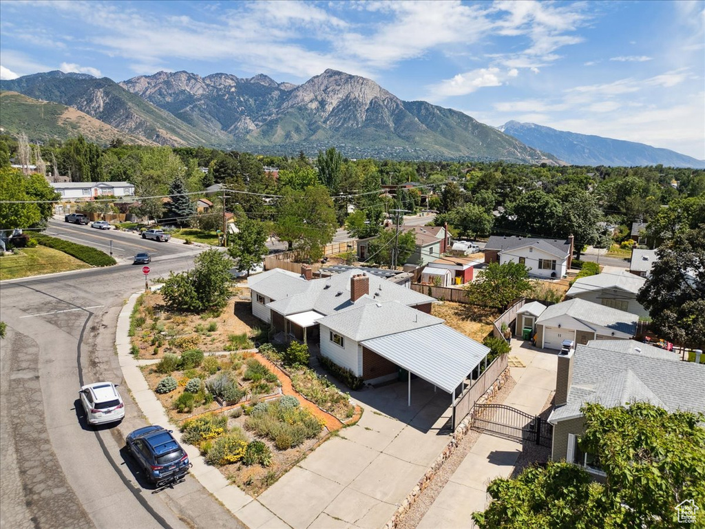 View of mountain background featuring nearby suburban area