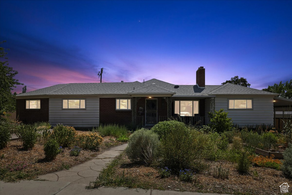 Single story home with a chimney