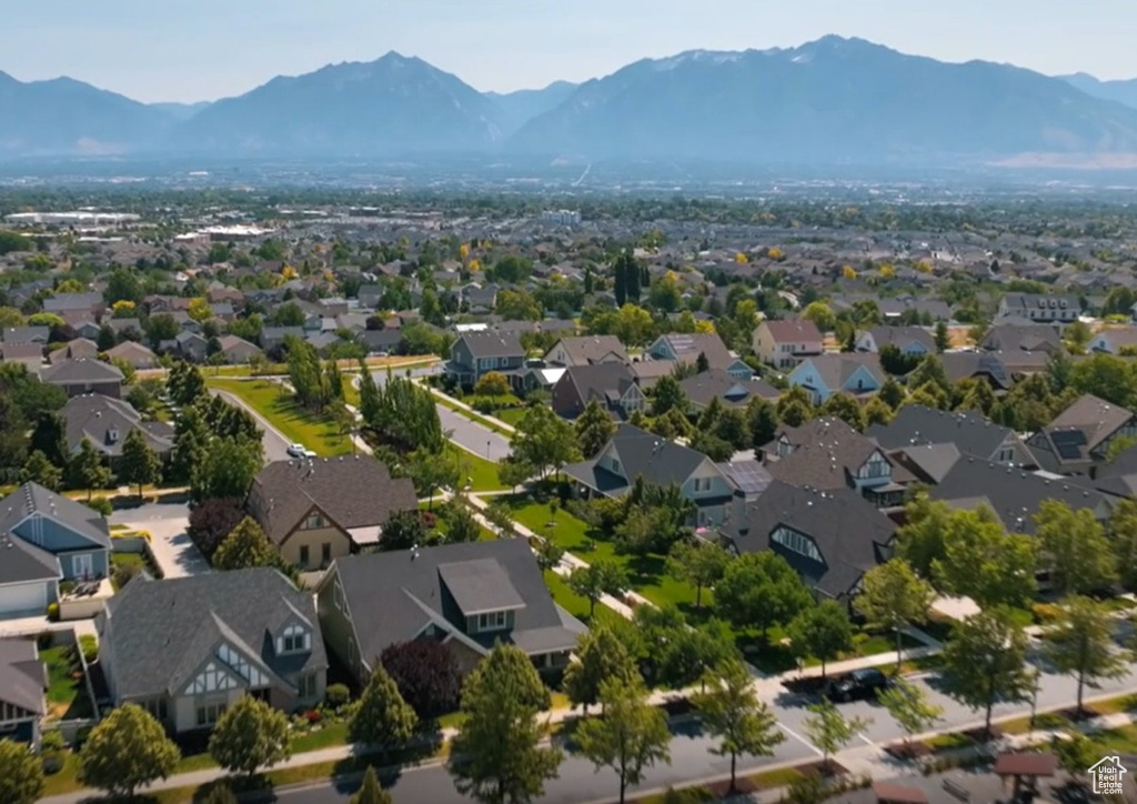 Aerial view of residential area with a mountainous background