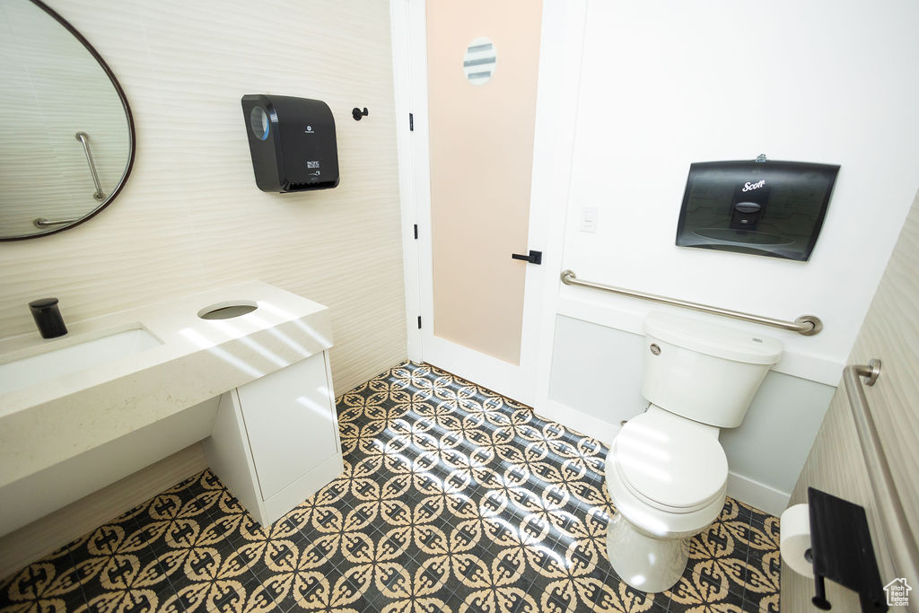 Bathroom featuring toilet and vanity