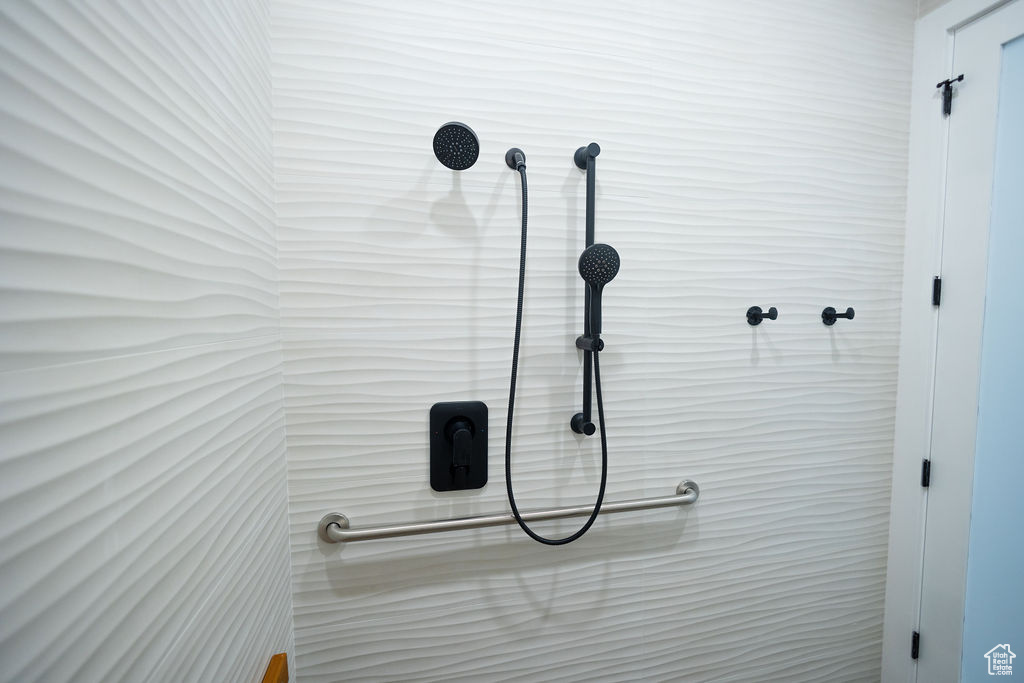 Bathroom view of a tile shower