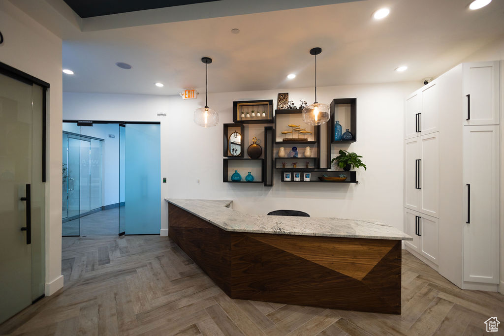 Bar featuring recessed lighting and decorative light fixtures