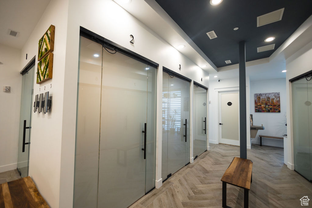 Hall featuring recessed lighting and elevator
